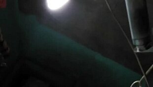 Young Asian mom with big boobs bathes in shower, showing tits.