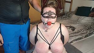 This big breasted sub slut endures hardcore tit slapping and rough spanking