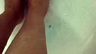 i take off my nylon and take a shower, giving footjob to babe