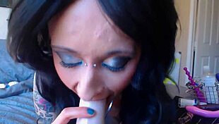 Tattooed Milf Rides Dildo Hard