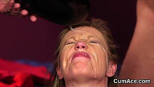 Unusual hottie receives multiple cumshots in a blowbang bukkake, gulping every drop from facial POV.