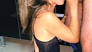 Blonde wife enjoys intimate moment with husband in the kitchen