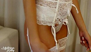 Pretty Brazilian teen strips down to white lingerie solo