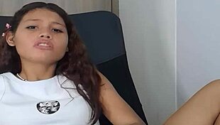 Woman teases pussy with dildo in intriguing scene