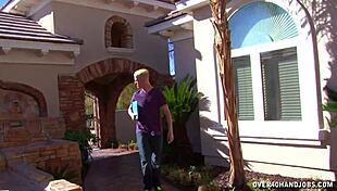 In this scene, a huge-titted blonde strokes a young guy's cock.