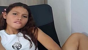 Woman teases pussy with dildo in intriguing scene