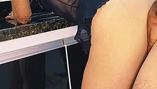 Blonde wife enjoys intimate moment with husband in the kitchen