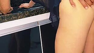 Blonde wife enjoys intimate moment with husband in the kitchen