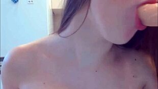 sexy brunette with glasses toys herself solo