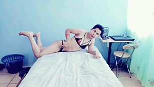 young gay guy in crossdressing session in his room