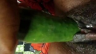 Cyndy blackslave fucks cucumber close up with squirt