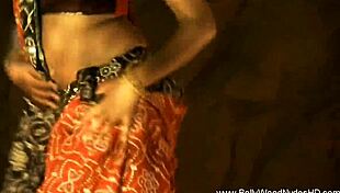 Indian brunette performs softcore dancing and striptease