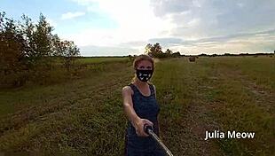 Juli Smith Undresses Outdoors in Public Field