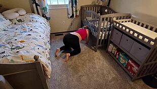 why is the pregnant stepmother bent over under the crib with her tits out?