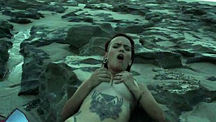 She orgasms on the beach with big ass