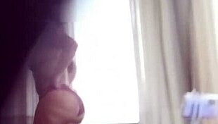 Stepmother with a big ass caught on hidden camera while flashing