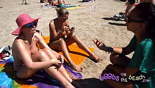 Topless sluts reveal big tits on beach
