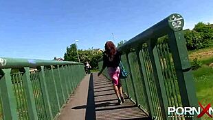 Redhead Ebony Goddess Pisses Nude Outdoors In Public