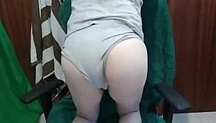 Gay man intensely masturbates with a chair in bold action