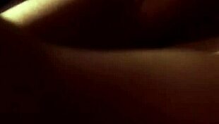 sexy brunette naked by the fire, dancing and teasing