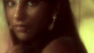 sexy brunette naked by the fire, dancing and teasing