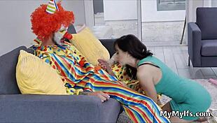 Horny Housewife Engages In Intimate Encounter With Clown In Reality Setting.