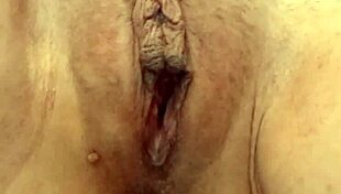 Sexy petite brunette exhibitionist opens pussy and pisses in public.