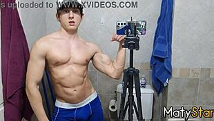 Watch me flex my muscles and cum hard in the bathroom