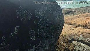 Beautiful young girl gets watched having public sex on beach rocks!