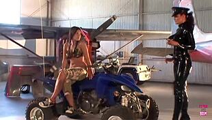 Two Lesbian Friends Use Strap-On In Warehouse