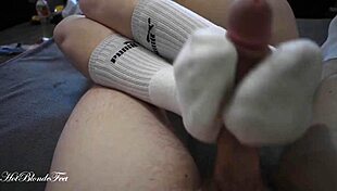 Blonde Miley Grey's sexy footjob in long socks contrasts with monster cock fetish