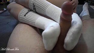 Blonde Miley Grey's sexy footjob in long socks contrasts with monster cock fetish