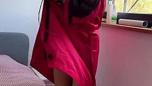 Girl masturbates wet pussy by the window