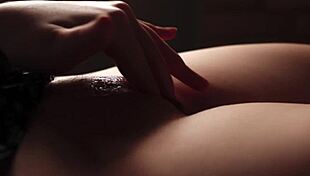 Teen caresses and slaps big pussy lips closeup in softcore striptease