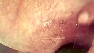 Intense close-up of big anal toys in gay porn