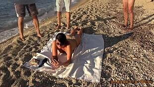 mass fuck happening on the hotel beach, free for everyone to join in