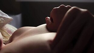 Teen caresses and slaps big pussy lips closeup in softcore striptease