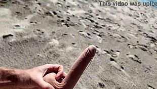 Curvy Nudist Stranger Plays with Dildo on Public Beach Funny
