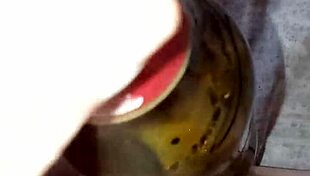 Gretala says, I'm pregnant and rubbing this bottle excitedly.