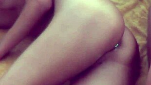 At the beach, a hot babe flashes her natural tits and ass with a buttplug for voyeurs.