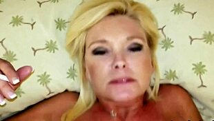 Housewife enjoys dirty talk and facial while pleasuring herself with a vibrator