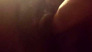 Pretty ebony solo girl reveals her big clit in close up while fingering and masturbating her black pussy.
