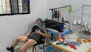 Indian seamstress fingers herself hot in clothing workshop.