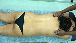 Big ass latina taking massage from desi black boy.