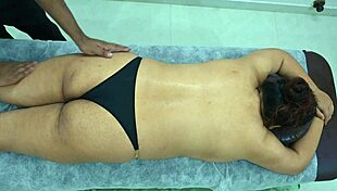 Big ass latina taking massage from desi black boy.