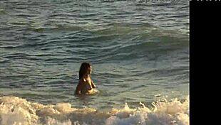 naked girl bent over on public beach gets doggystyle from brunette latina