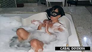 Young girl in hotel spa enjoys massage with friend