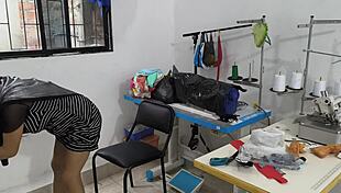 Indian seamstress fingers herself hot in clothing workshop.