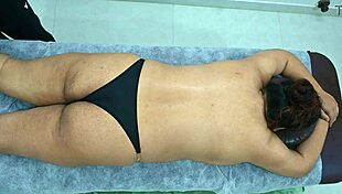 Big ass latina taking massage from desi black boy.