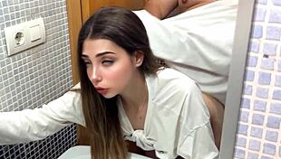 in the bathroom, she fucks her boyfriend's friend and he cums inside her, feeling the hot semen.